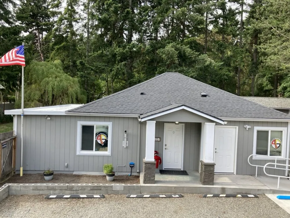 Slide of Peninsula Peaks Roofing
