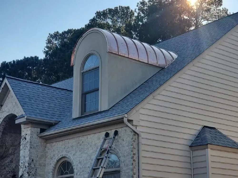 Slide of Peninsula Roofing Company