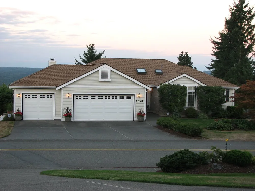 Local flat roof repair in Olalla, WA by Peninsula Roofing