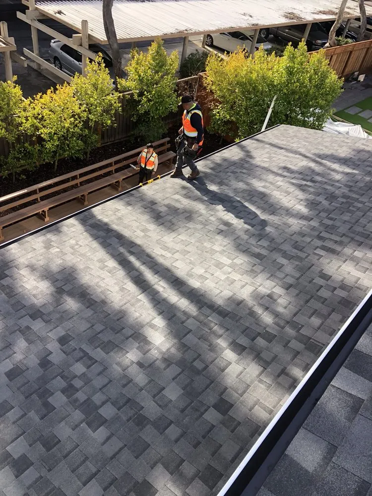 Slide of Peninsula Roofing