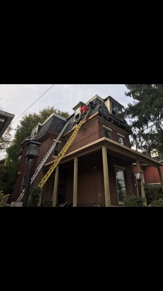 Slide of Penn Roofing