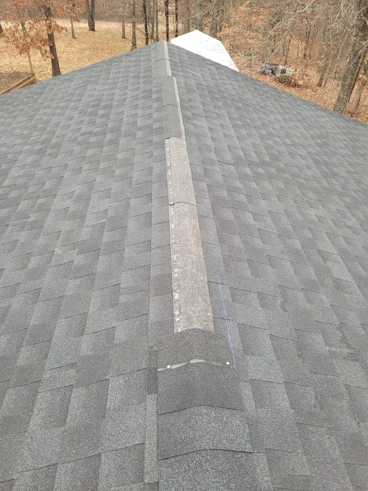 Professional storm damage roof repair same-day service in House Springs, MO by Pennington Roofing