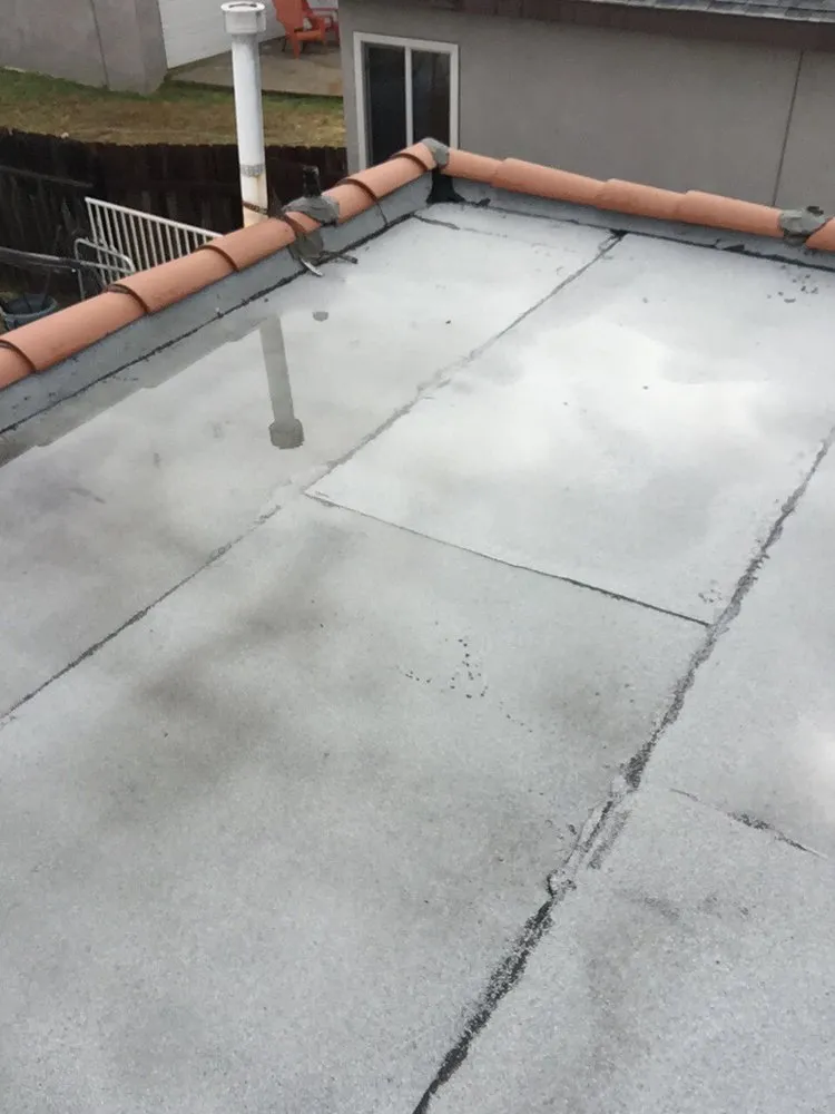 Slide of Penny Roofing