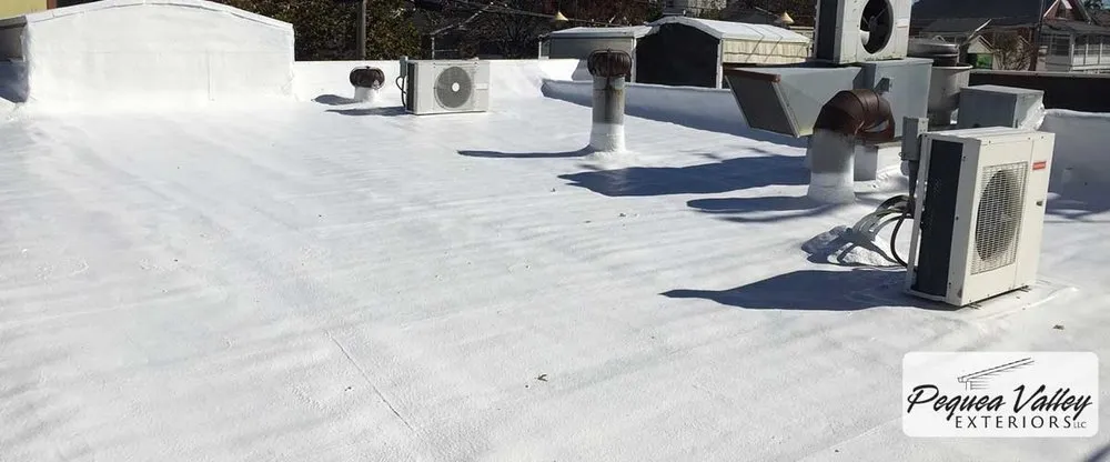 Local flat roof repair after storm damage across Kinzers, PA - Pequea Valley Exteriors