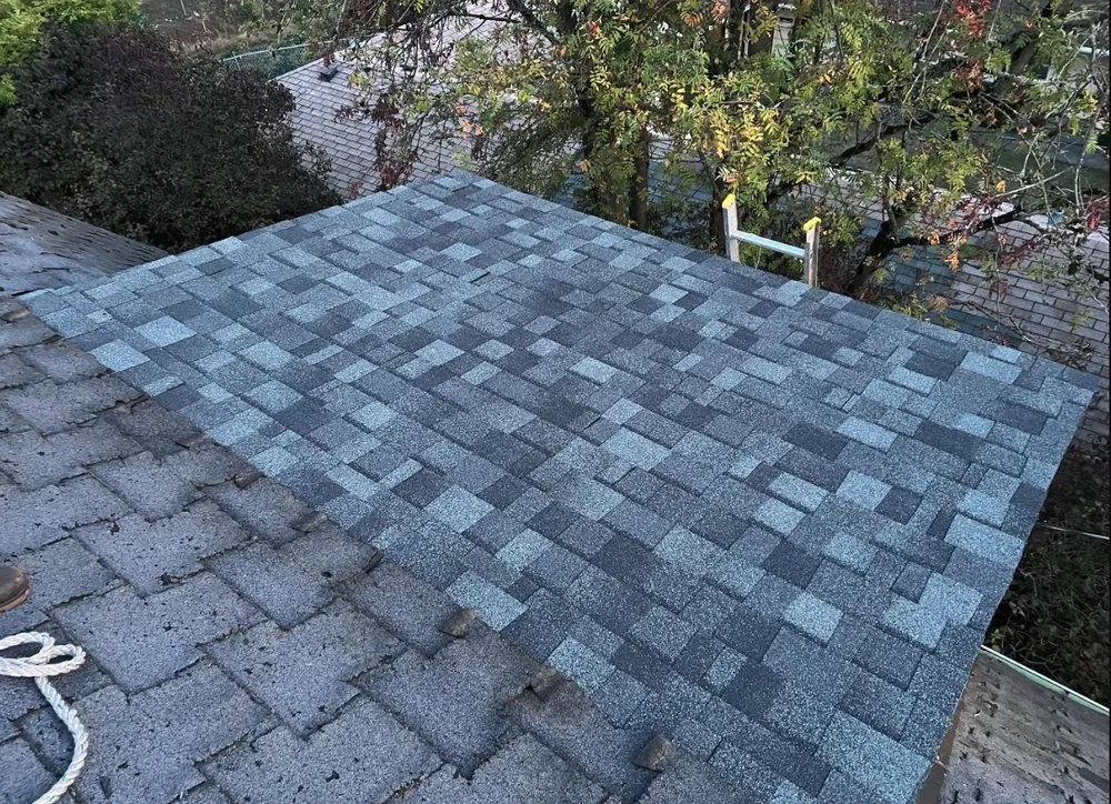 Slide of Perdigon Roofing