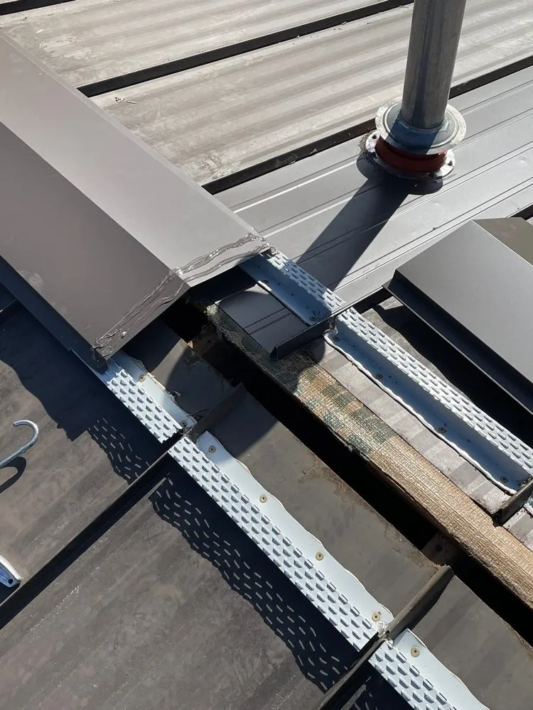 Slide of Perdigon Roofing