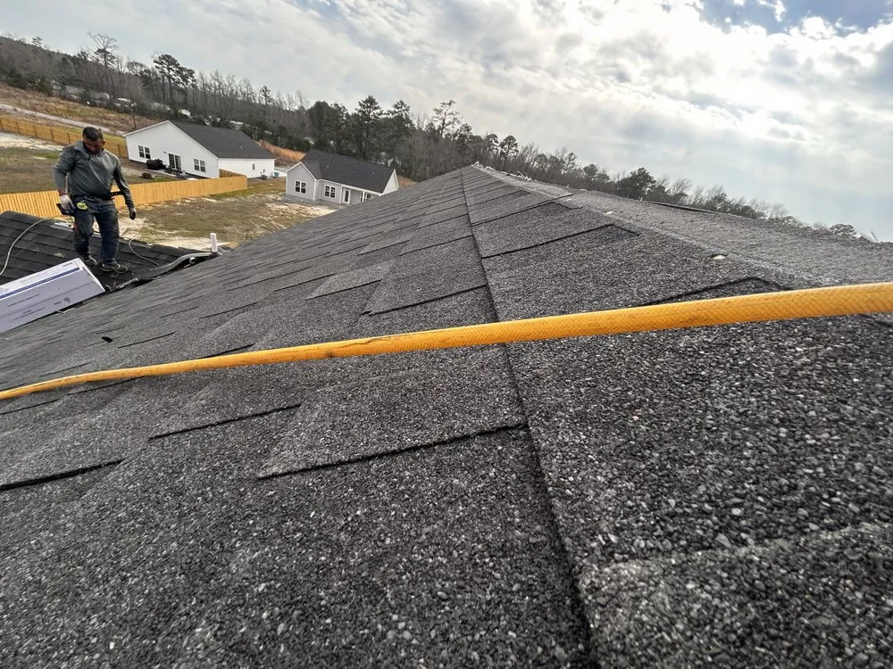 Slide of Perdomo Roofing