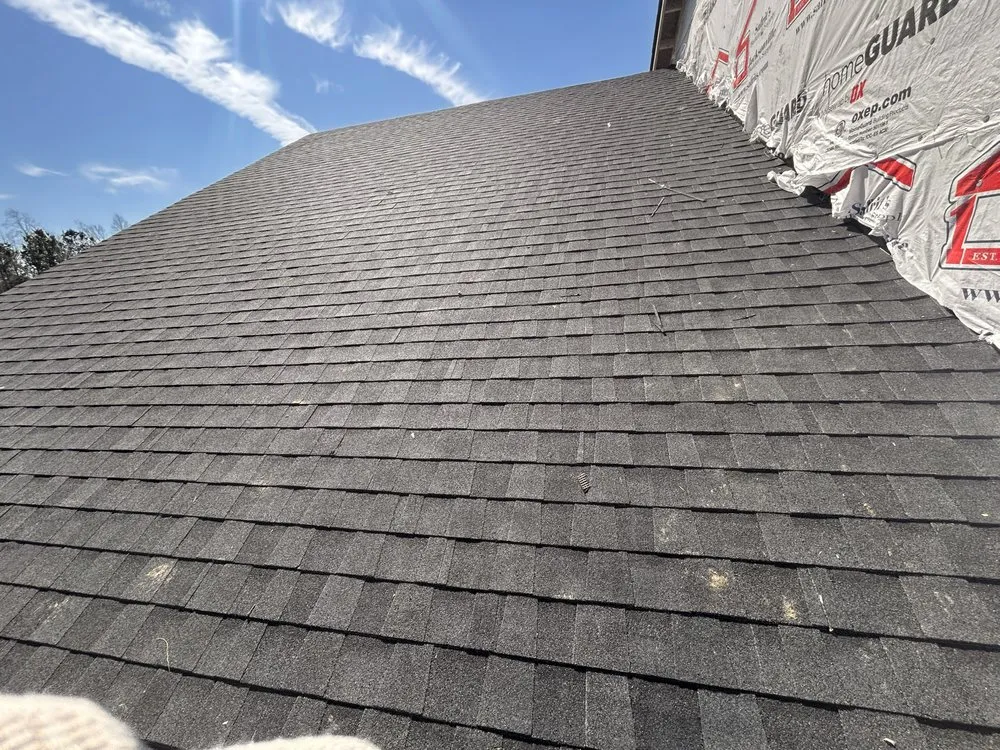 Slide of Perdomo Roofing