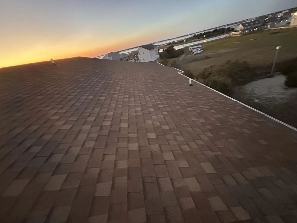 Slide of Perdomo Roofing