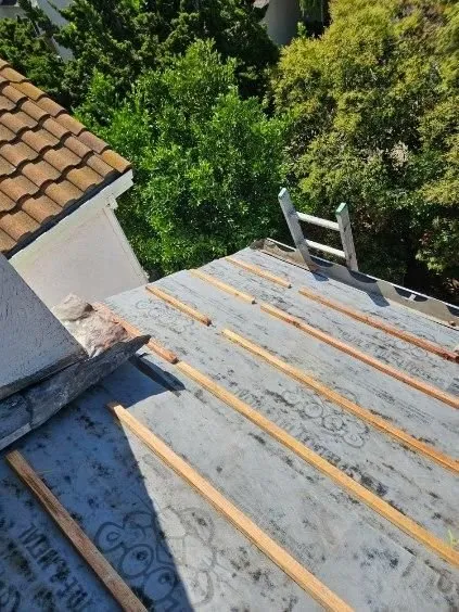 Slide of Perez Roofing