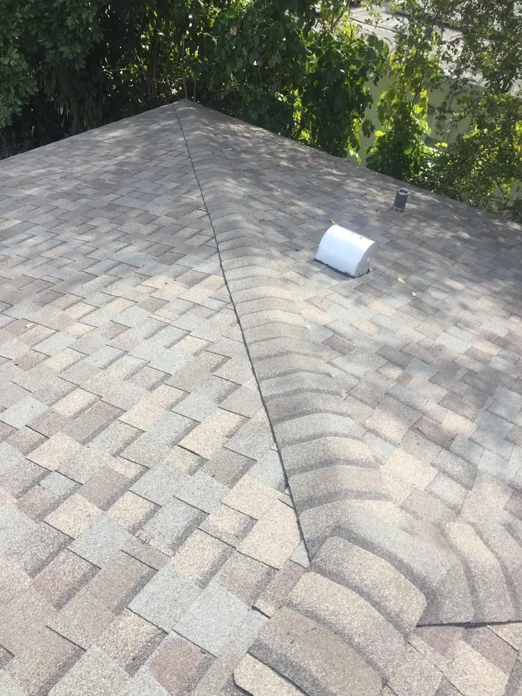 Slide of Perkins Roofing - Miami