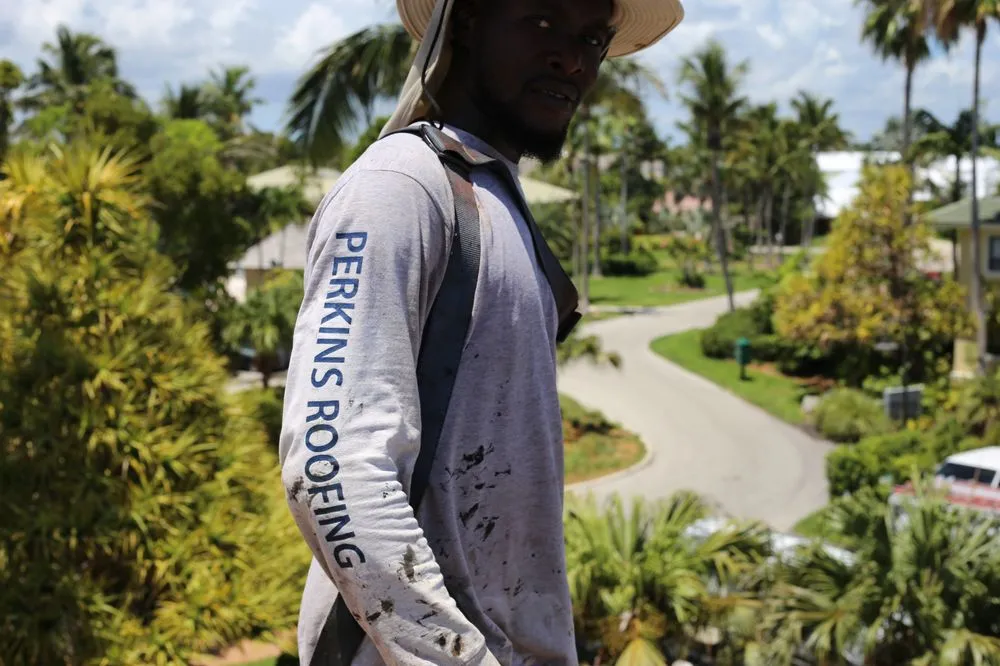 Slide of Perkins Roofing - Miami
