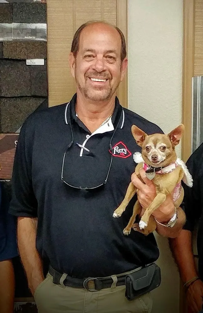 Slide of Perry Roofing