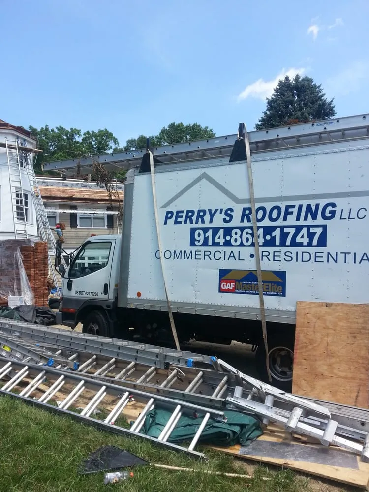 Slide of Perry's Roofing