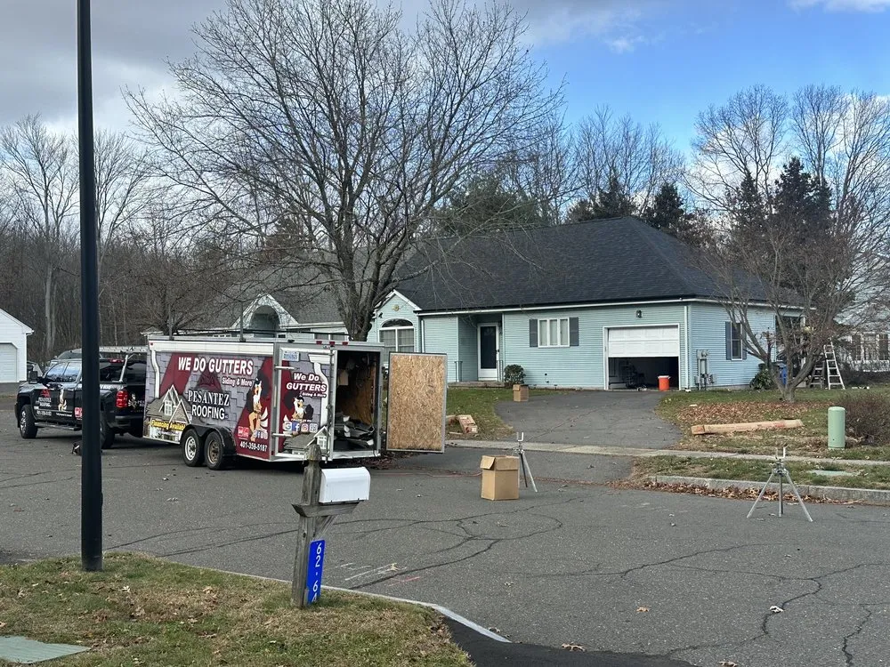 Slide of Pesantez Roofing