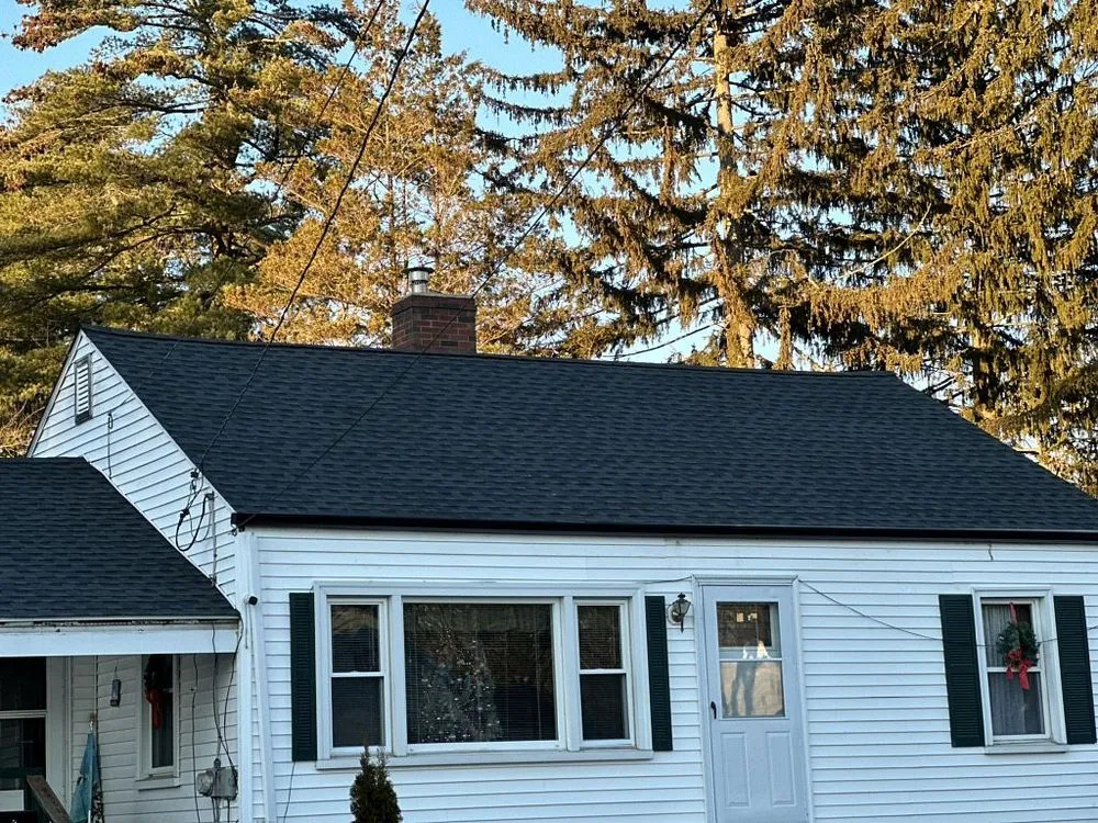 Slide of Pesantez Roofing