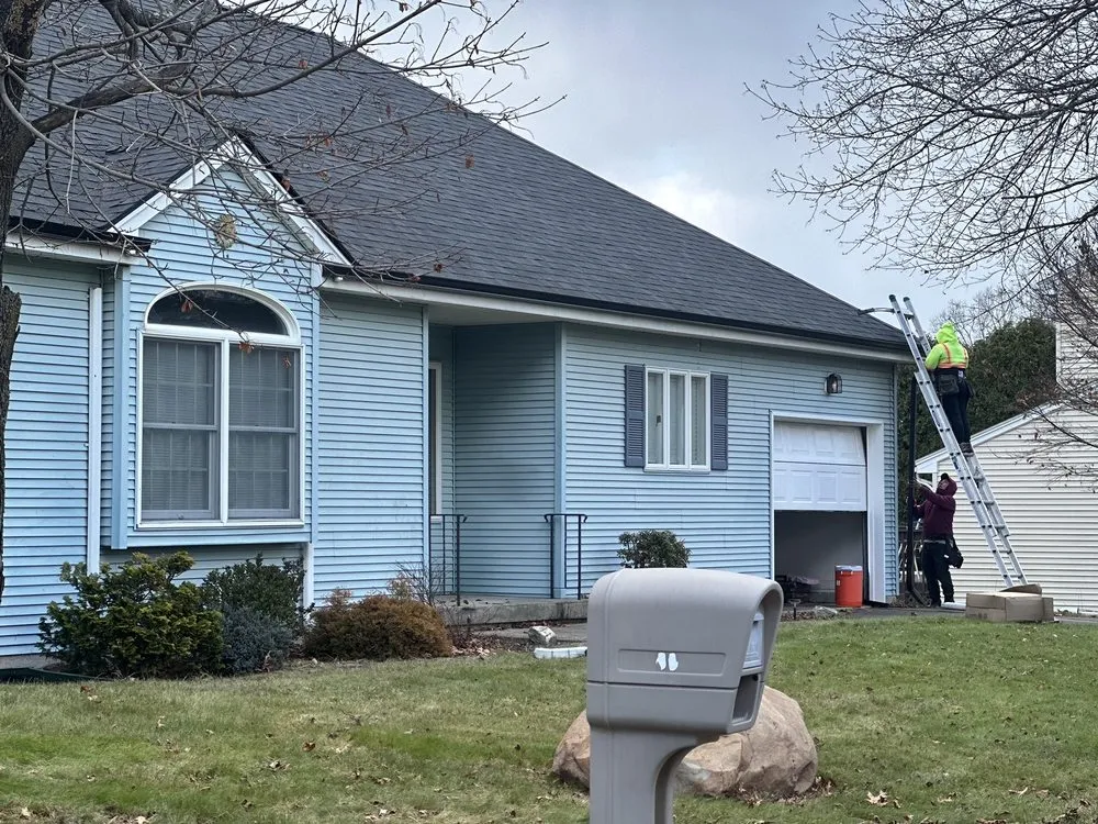 Slide of Pesantez Roofing