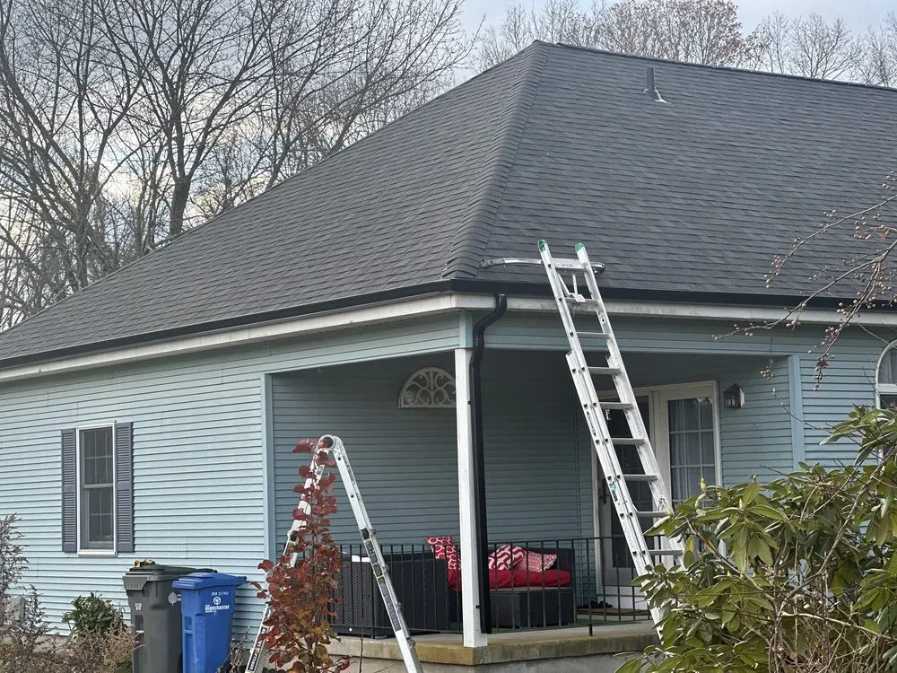 Slide of Pesantez Roofing