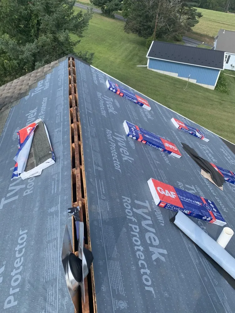 Slide of Peters Roofing and Gutters