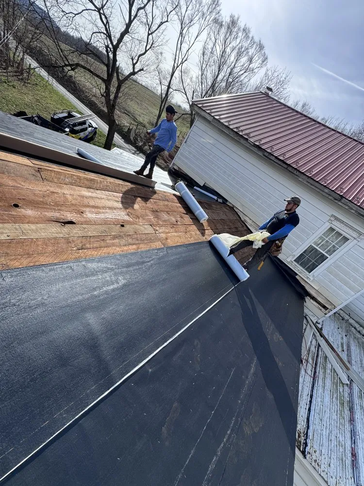 Slide of Peters Roofing and Gutters