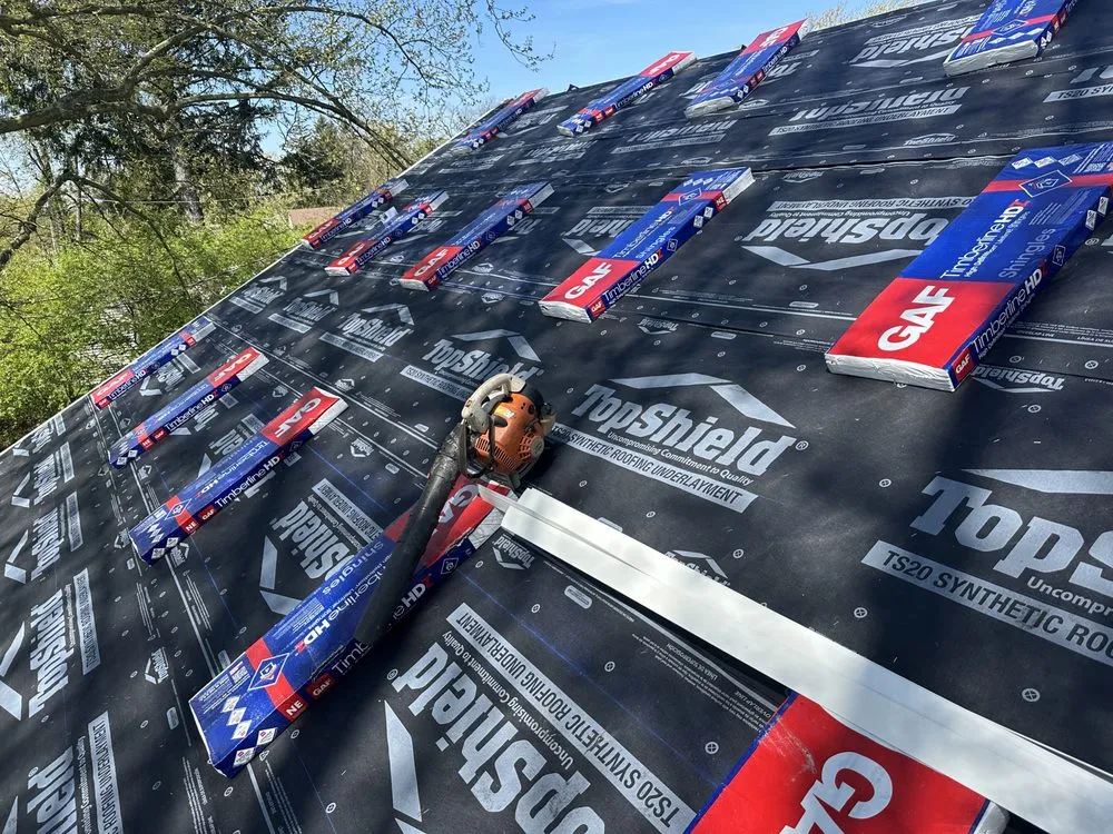 Slide of Peters Roofing and Gutters