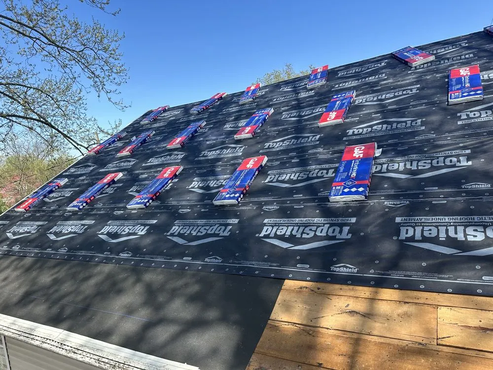 Slide of Peters Roofing and Gutters