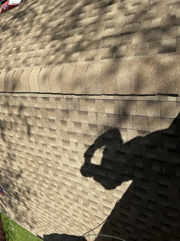 Slide of Peters Roofing and Gutters