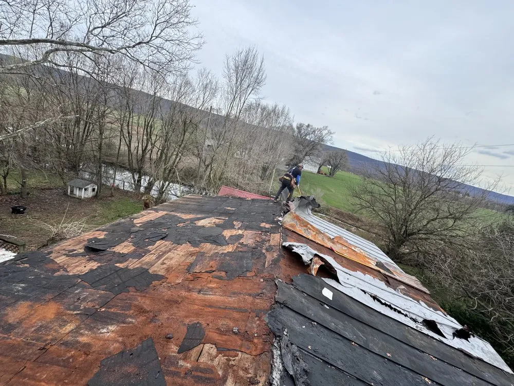 Slide of Peters Roofing and Gutters