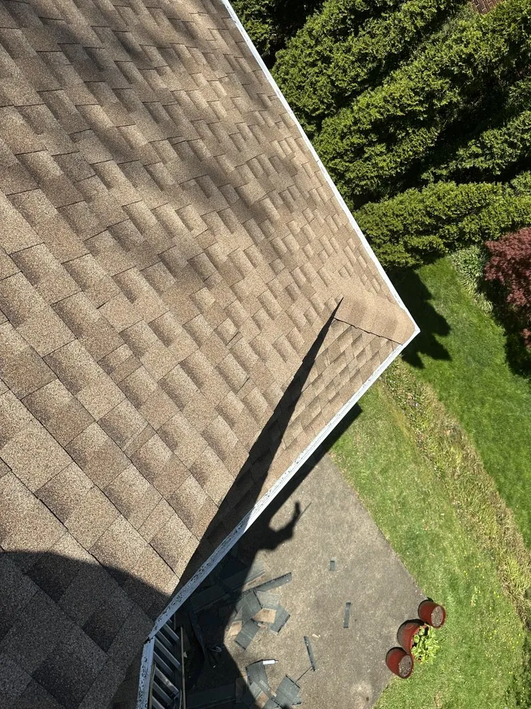 Slide of Peters Roofing and Gutters