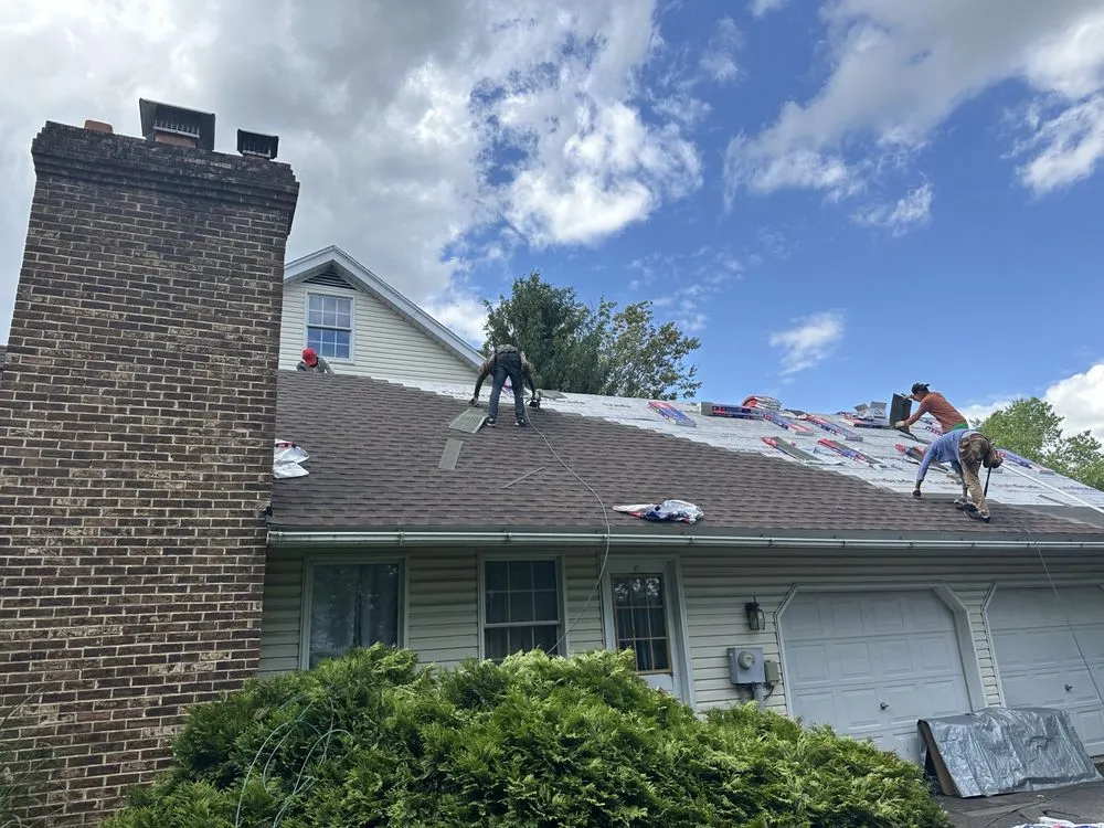 Slide of Peters Roofing and Gutters