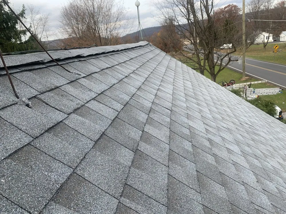 Slide of Peters Roofing and Gutters