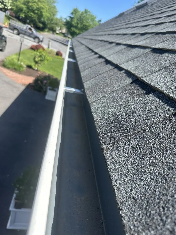 Slide of Peters Roofing and Gutters