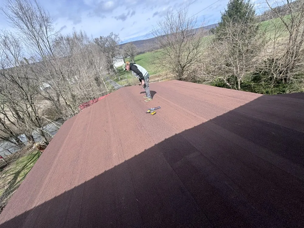 Slide of Peters Roofing and Gutters