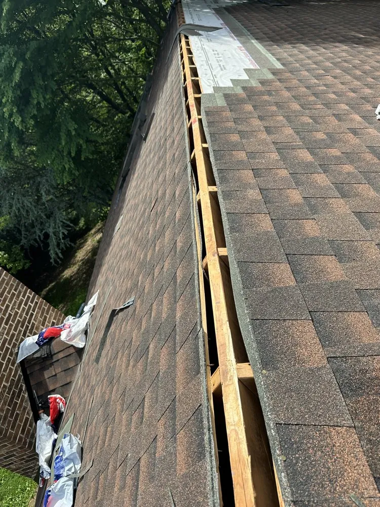 Slide of Peters Roofing and Gutters