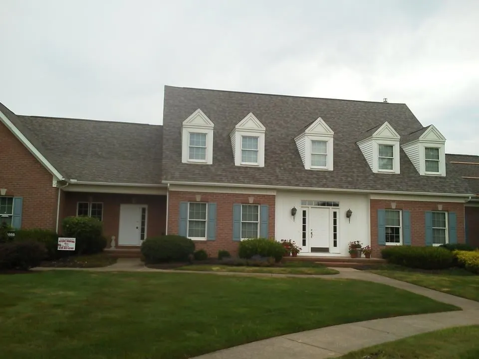 Slide of Peters' Roofing