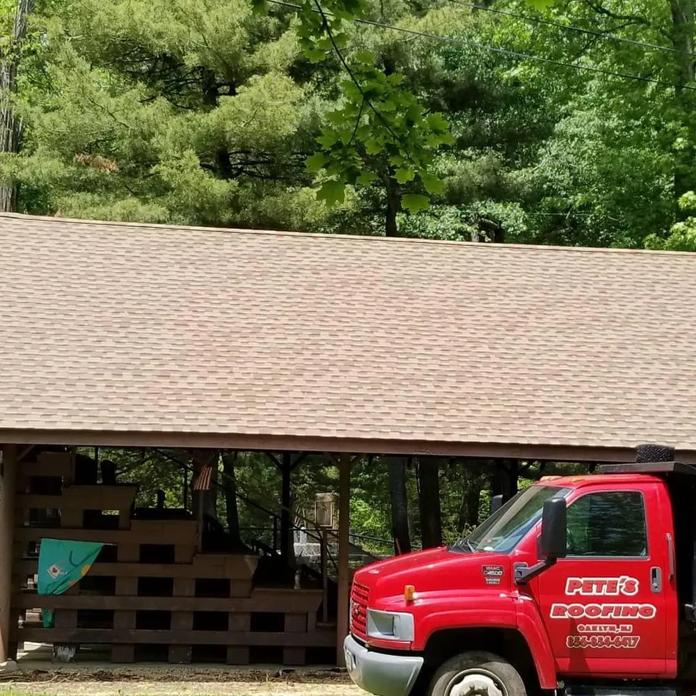 Slide of Pete's Roofing and Son