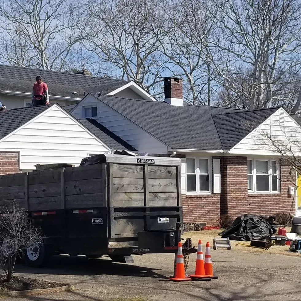 Slide of Pete's Roofing and Son