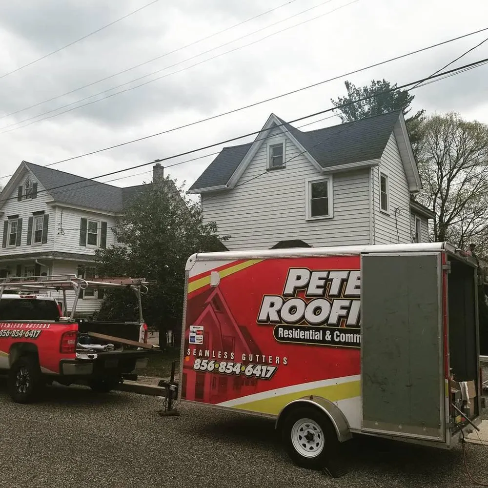 Slide of Pete's Roofing and Son