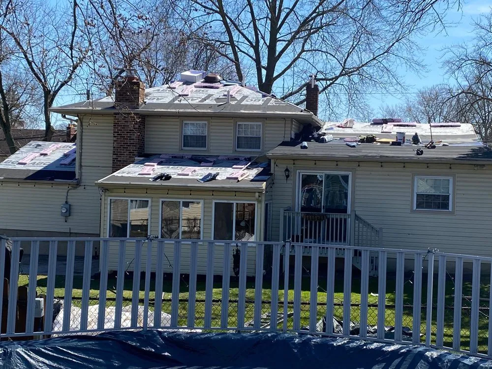 Slide of Pete's Roofing and Son