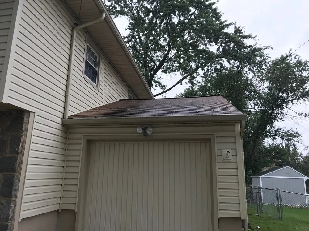 Slide of Pete's Roofing and Son