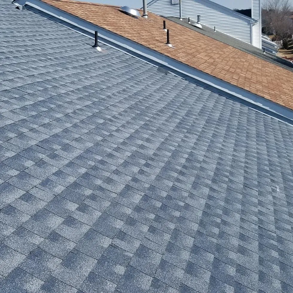 Slide of Pete's Roofing and Son