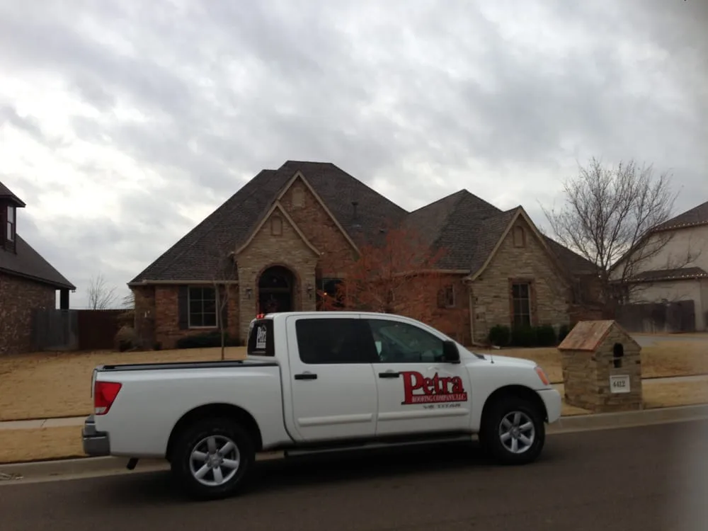 Slide of Petra Roofing Company