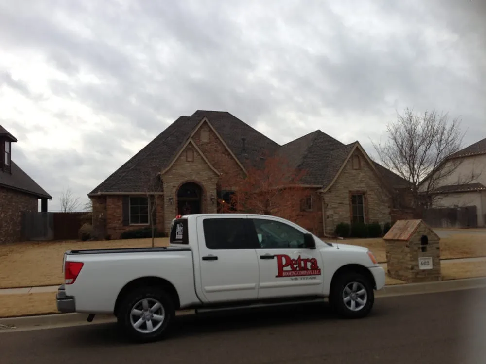 Slide of Petra Roofing Company