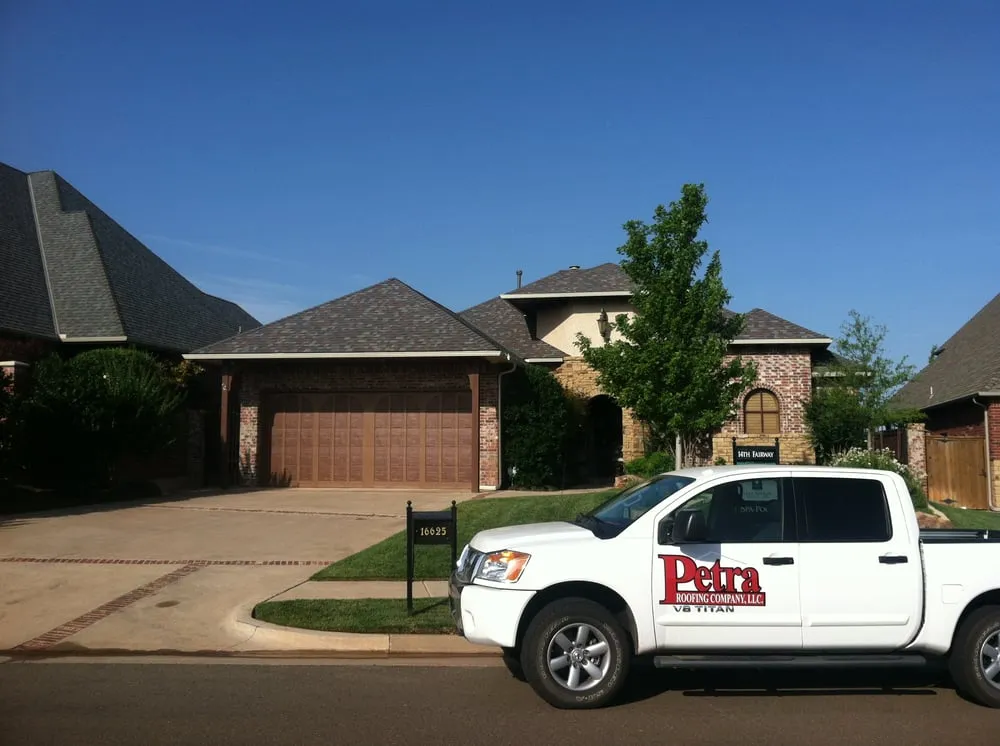 Slide of Petra Roofing Company