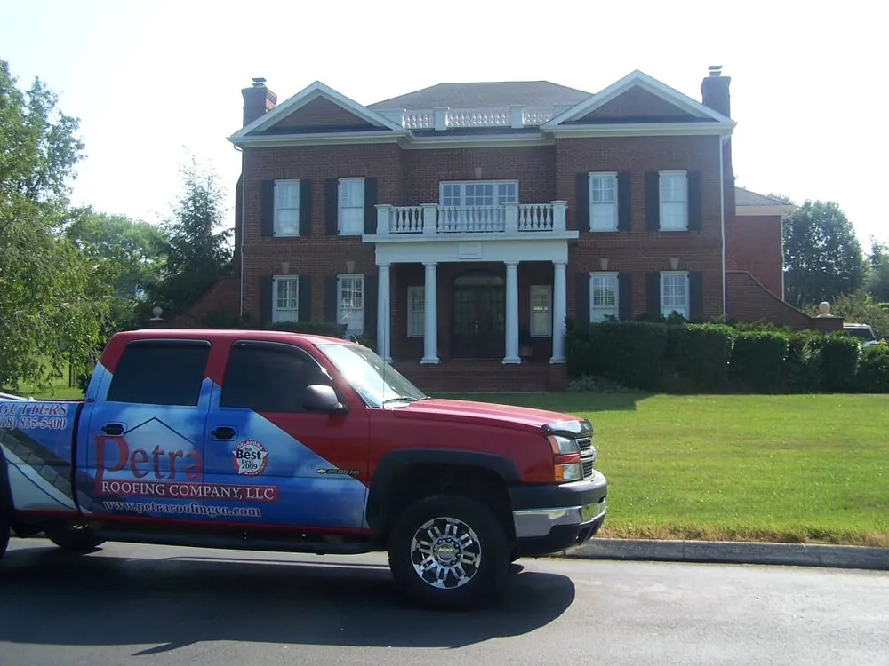 Slide of Petra Roofing Company