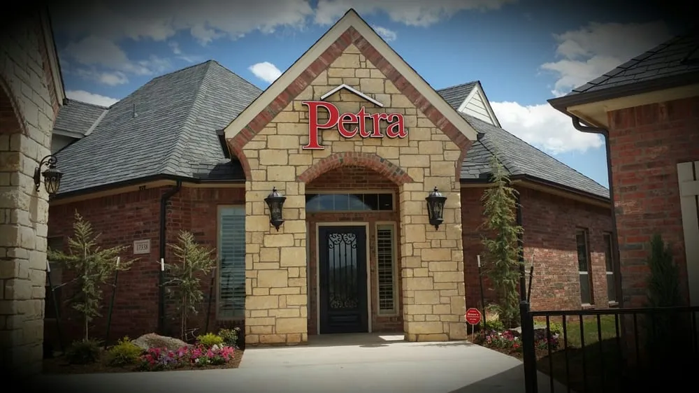 Slide of Petra Roofing Company