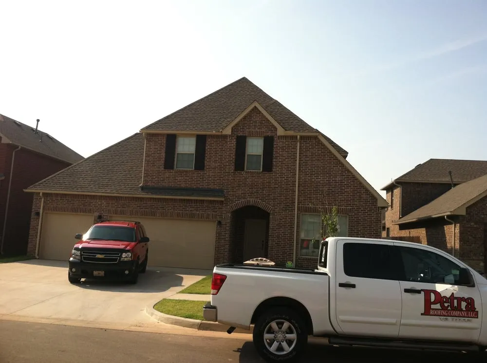 Slide of Petra Roofing Company