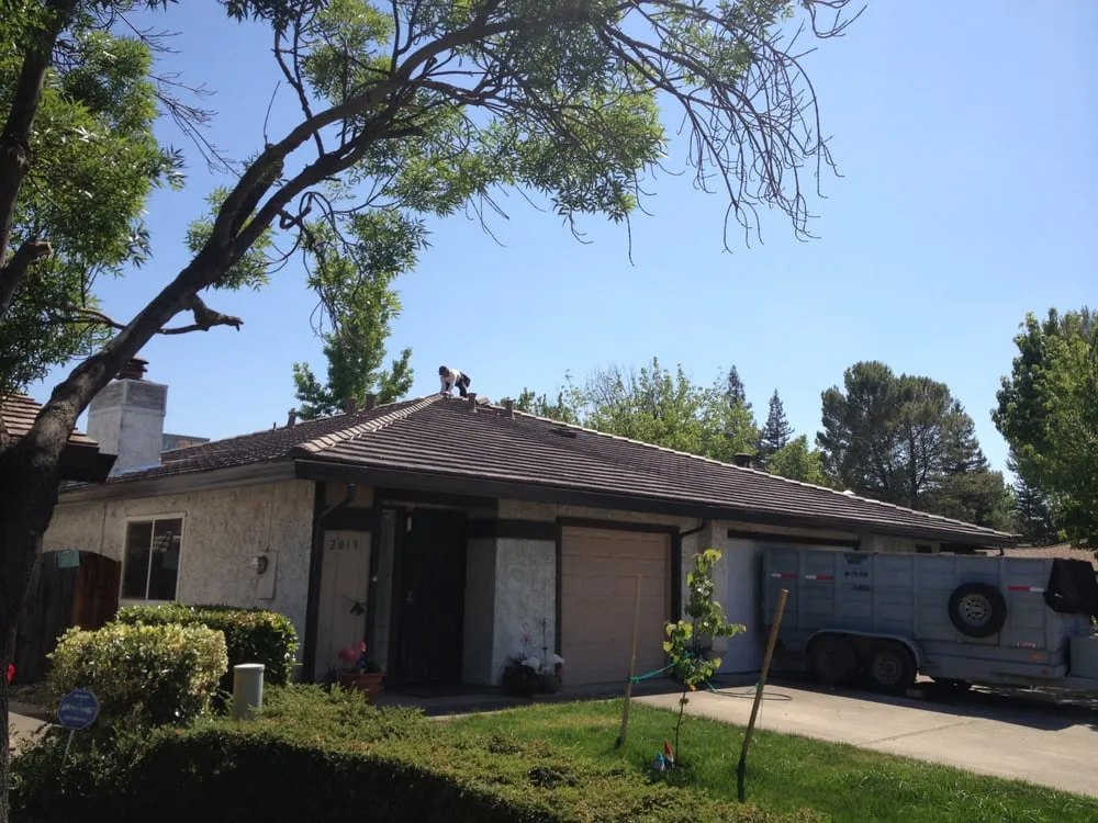 Slide of Petrashishin Roofing Co