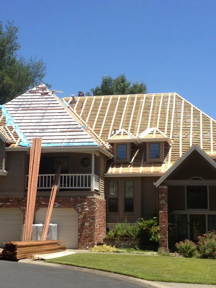 Slide of Petrashishin Roofing Co