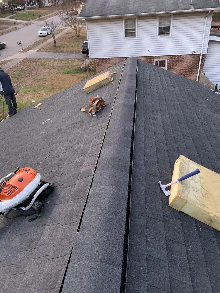 Slide of PhanY Roofing